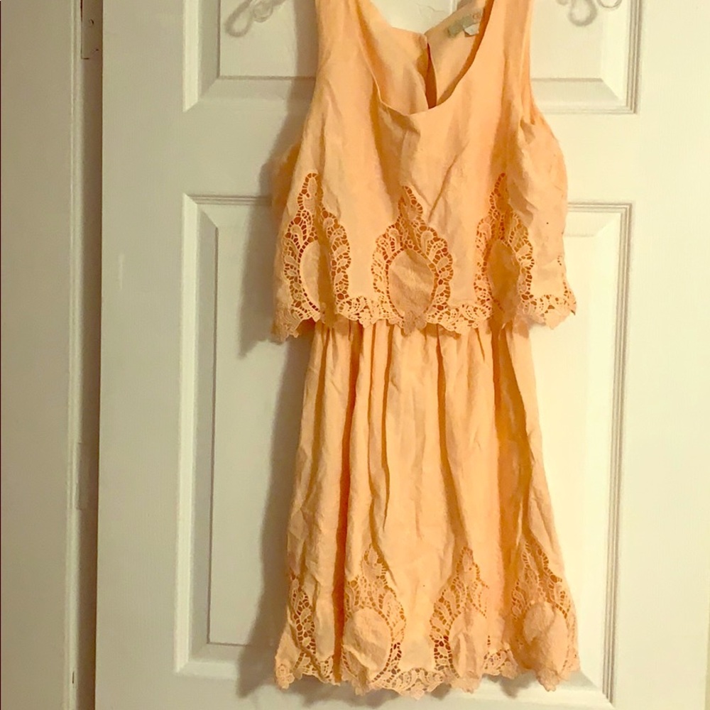 Cotton peach color dress.
